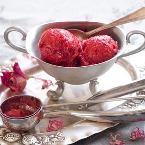 Strawberry ice cream in vintage bowl, selective focus